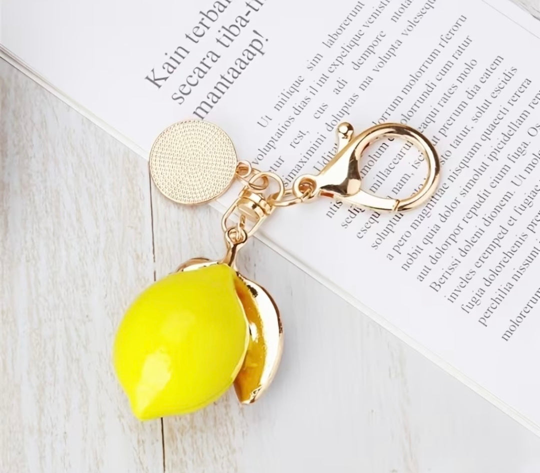 Yellow lemon crystal bag charm keyring with gold hardware