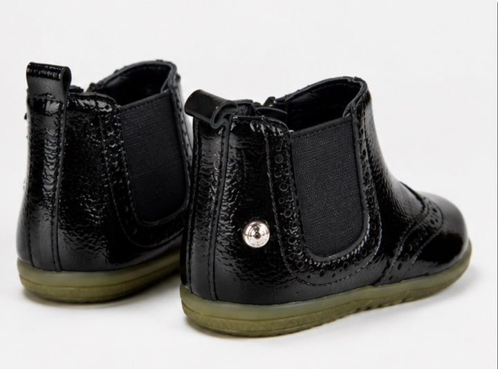 Children’s black patent ankle boots with textured finish, zip fastening and chunky sole
