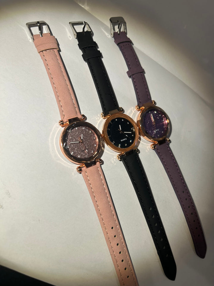 Glitter-faced watches with rose gold hardware and adjustable straps 