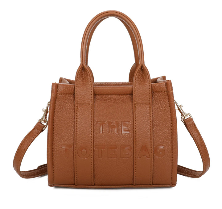 A tan mini tote bag with &