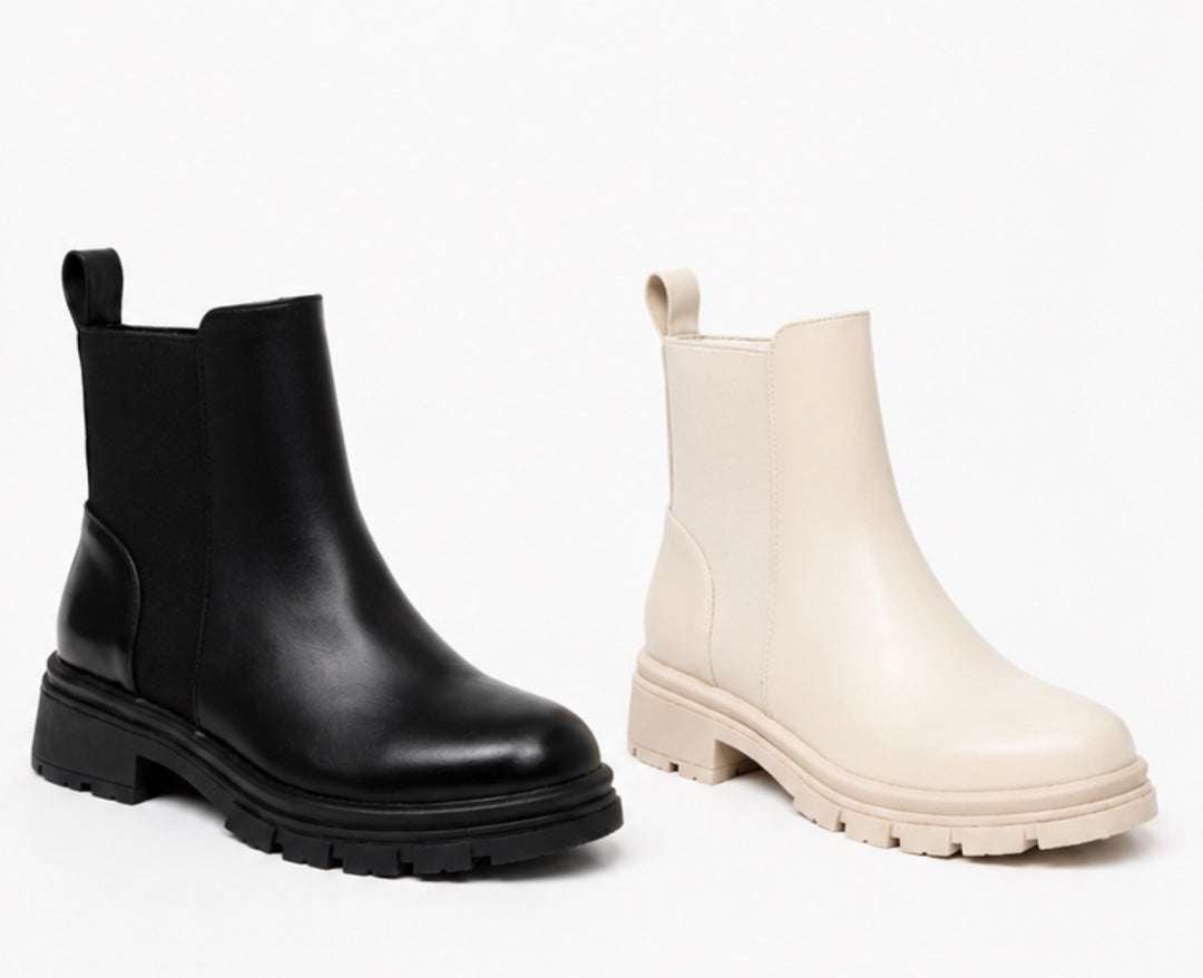 Women’s chunky ankle boots in black and cream with elastic stretch panels