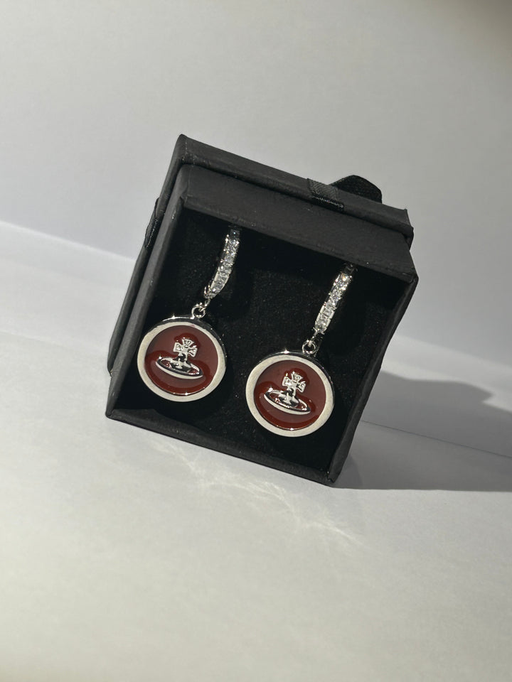 Burgundy planet dangle earrings