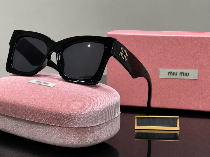 Black sunglasses with gold detail 