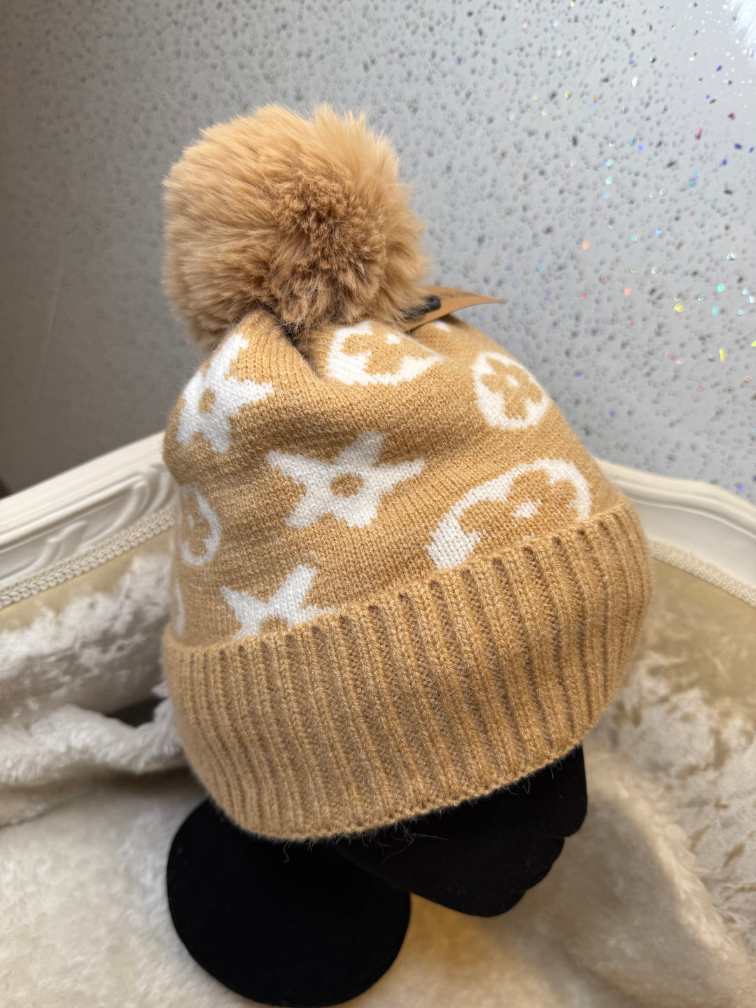 Flower detail bobble hats