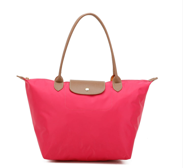 Fuchsia handbag with brown handles and outlined 