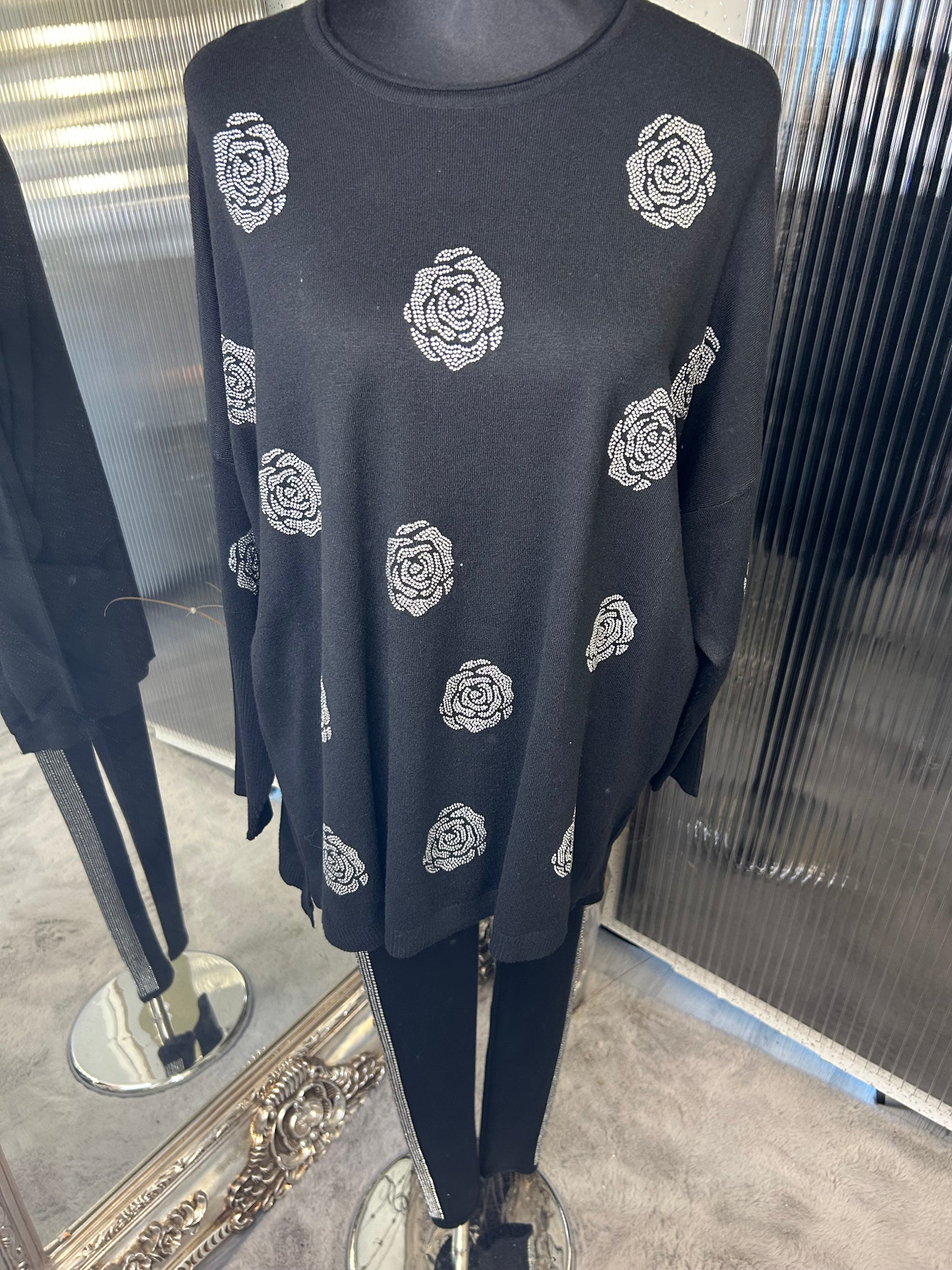 A black legging lounge wear set with crystal flower details 