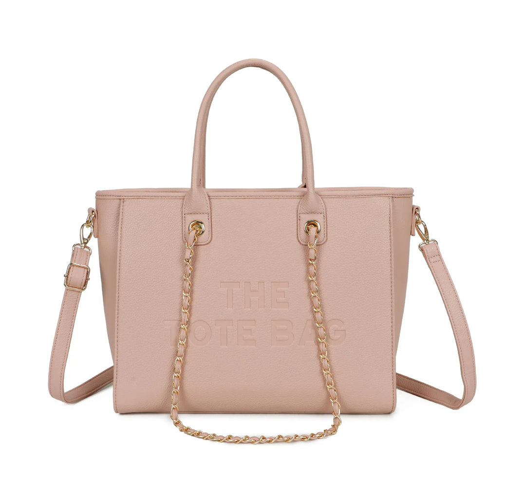Pink handbag with gold chain detail 