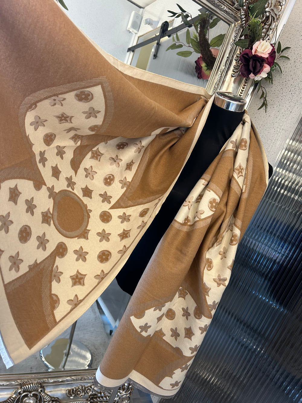 Oversized XL scarf with bold flower print design, displayed as a women’s fashion accessory.