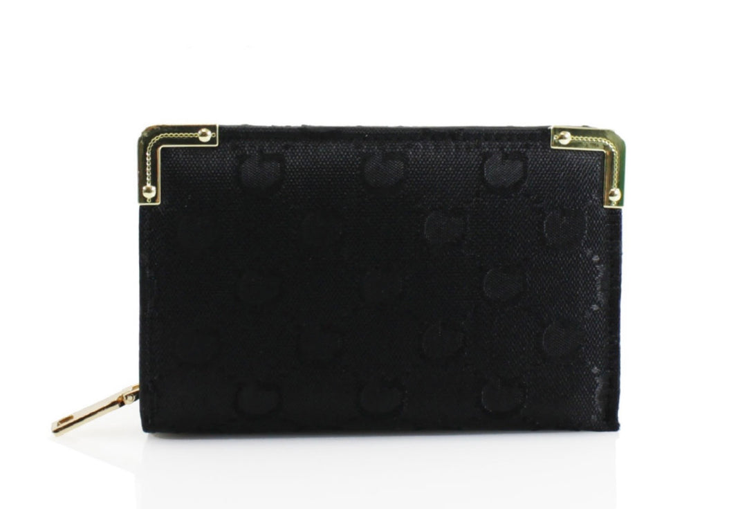 Black textured wallet with gold accents on a white background