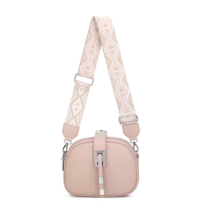     Pink crossbody bag with wide patterned adjustable strap