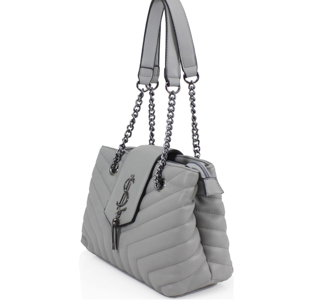 Grey quilted medium size handbag with metal hardware, chain straps and flap closure