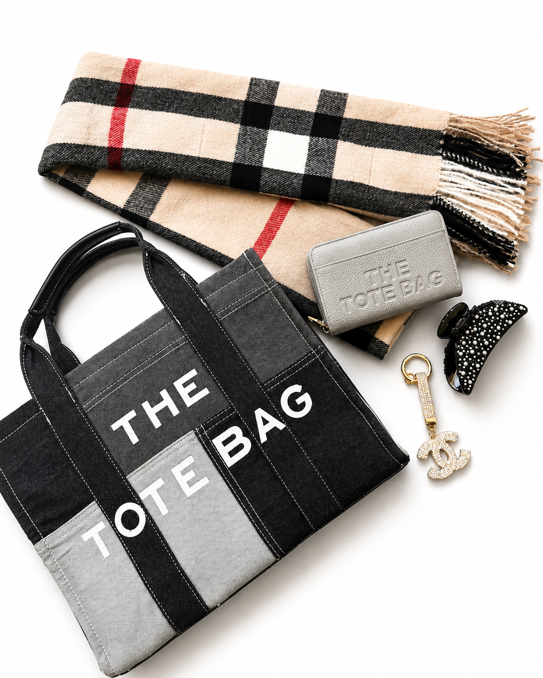 Luxury handbag bundle featuring a matching handbag, coordinating purse and elegant scarf styled together 