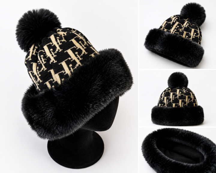 Luxury faux fur pom pom knitted winter hats in black with soft faux fur trim and warm fleece lining.