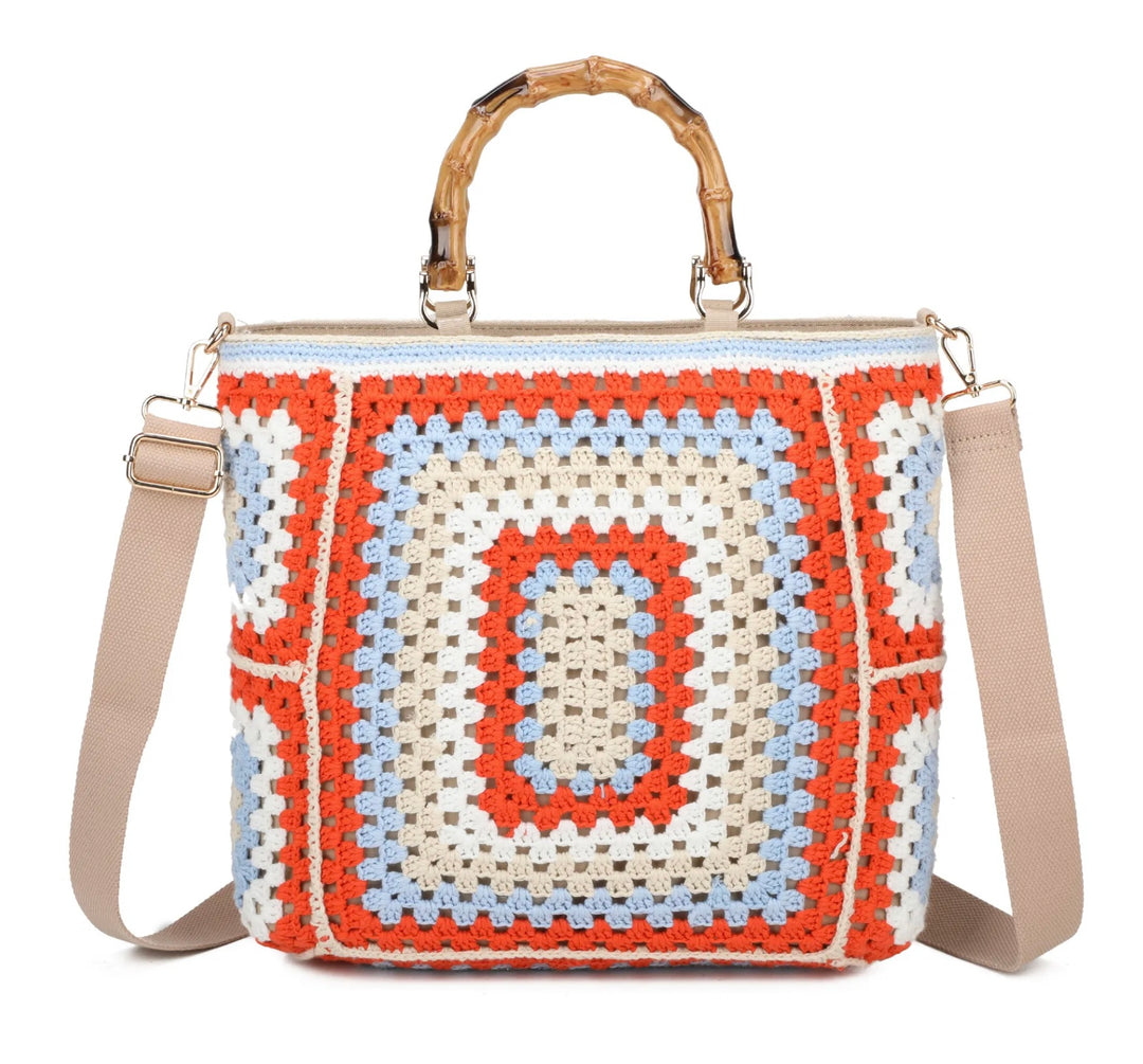 Cream based crochet grab bags with bamboo handles and a top zip closure