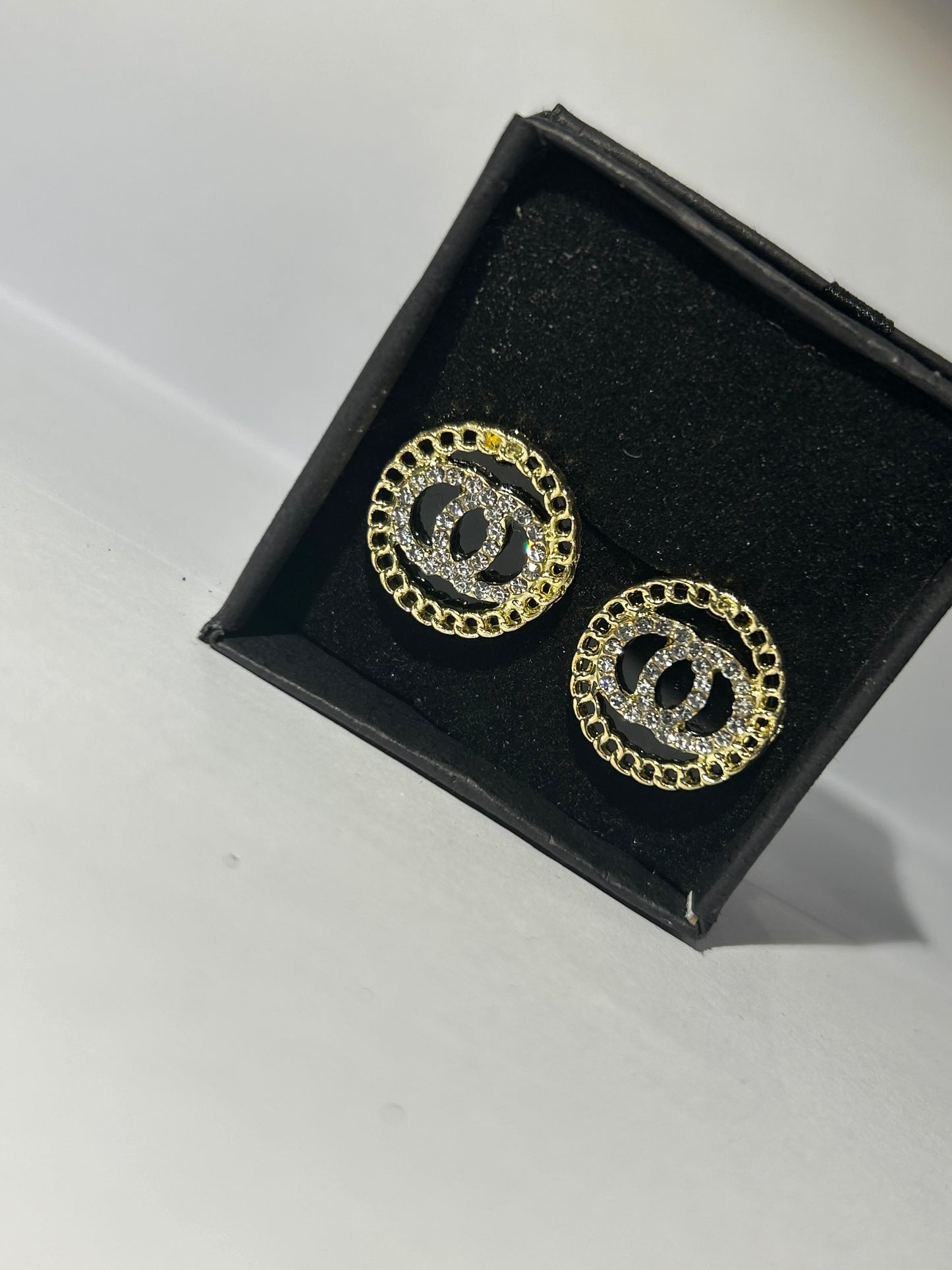 Black and gold circle earrings