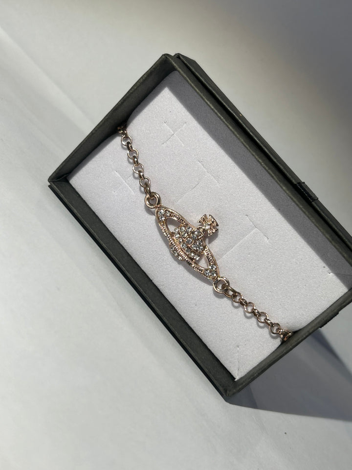 Rose gold planet bracelet