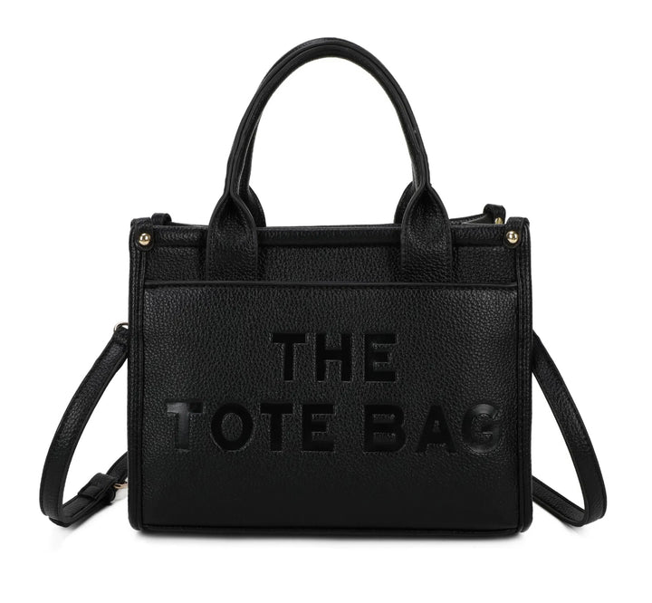 A black tote bag with the text &