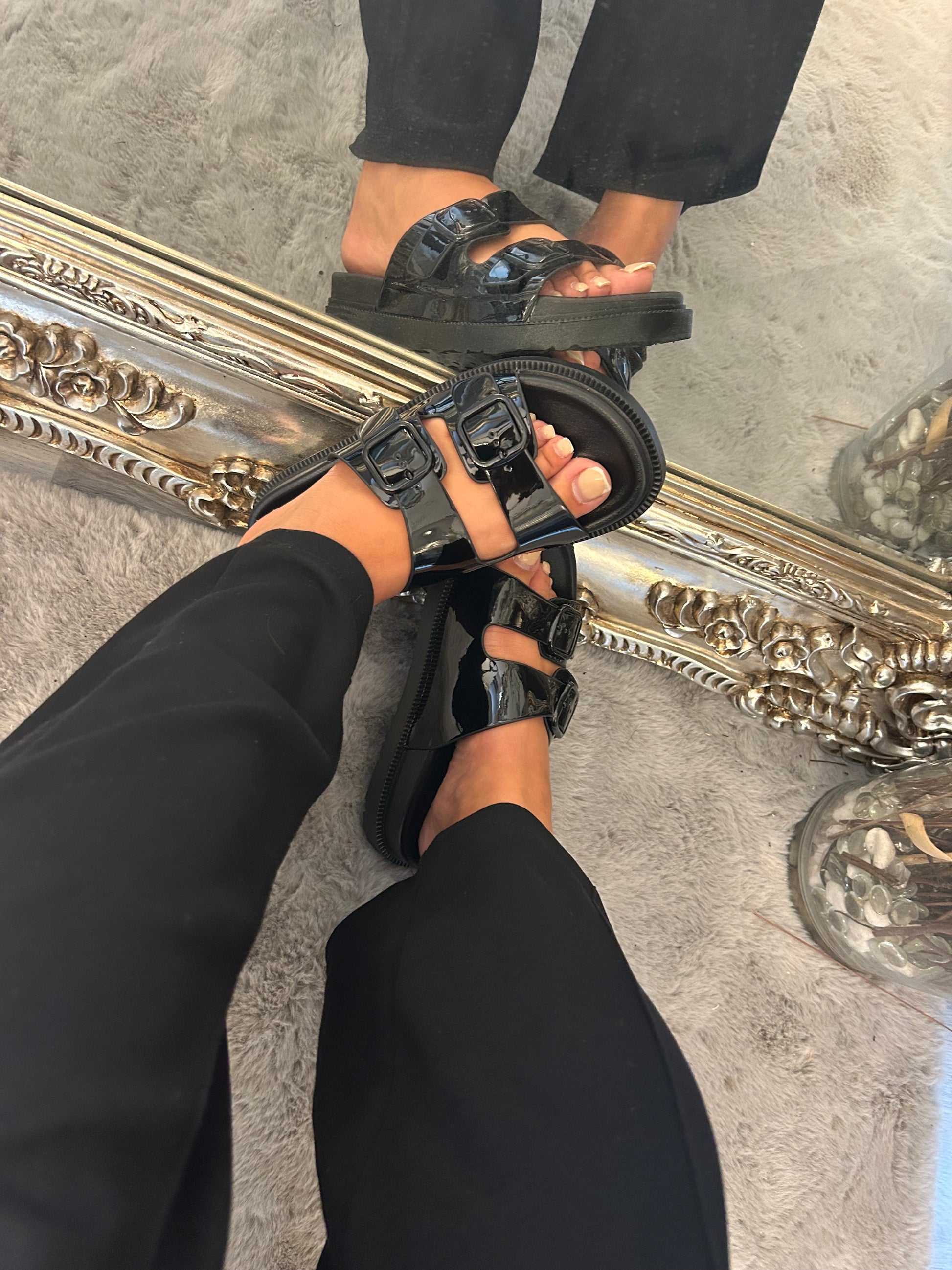 Black patent sandal with buckle design
