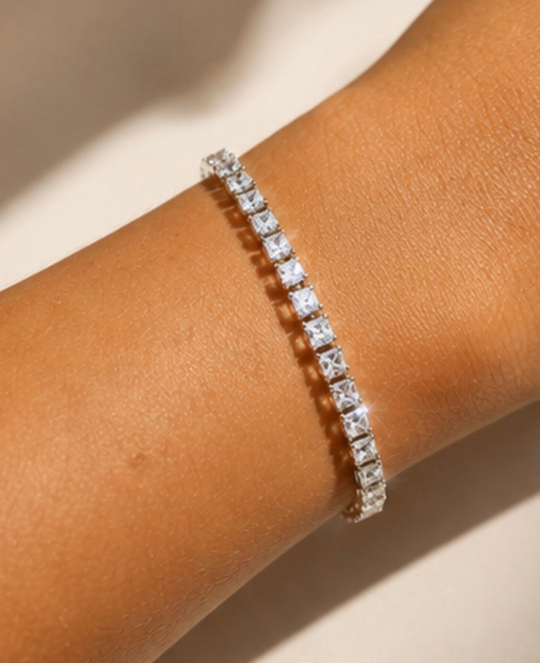 Silver tennis bracelet featuring sparkling square-cut cubic zirconia stones