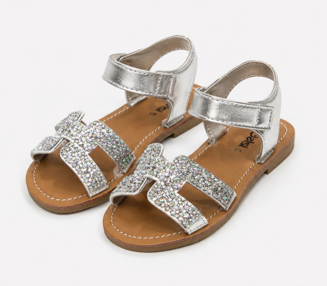 Girls silver glitter buckle sandals with metallic ankle strap and flat sole