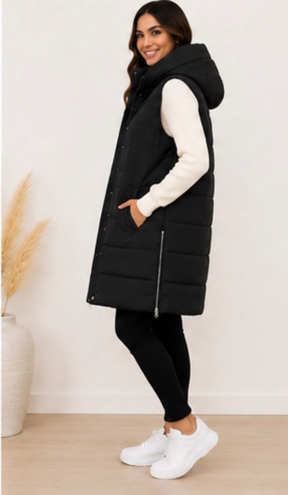 Long black padded gilet with hood, quilted design and front zip fastening, sleeveless puffer bodywarmer with pockets