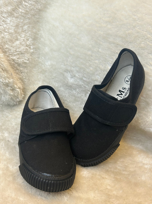 Children’s black canvas shoes with velcro strap and rubber sole