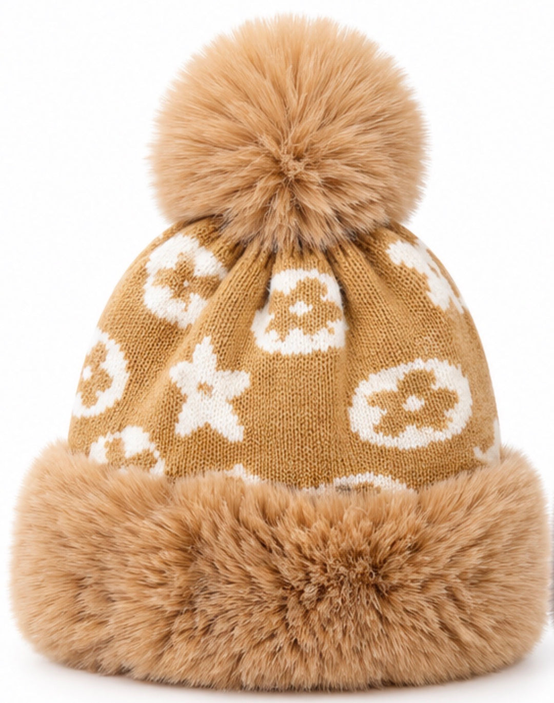 Luxury knitted winter bobble hats in camel beige and grey with cream monogram-style pattern, oversized fluffy pom poms, thick faux fur trims and soft fleece lining.