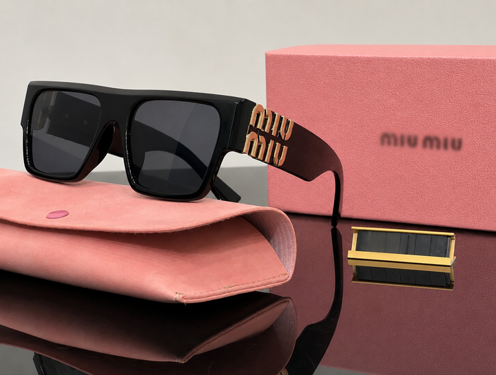 Black sunglasses with gold detail 