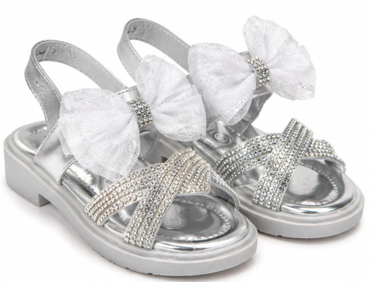 Silver girls’ sandals with sparkling diamanté crossover straps, oversized glitter mesh bow detail 