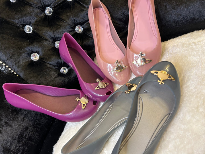 Pink, purple and grey ballet shoes with gold detailing