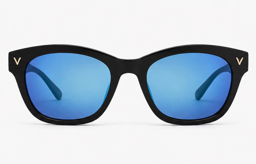 Black oversized sunglasses with glossy black frames, blue mirrored lenses and gold V detail