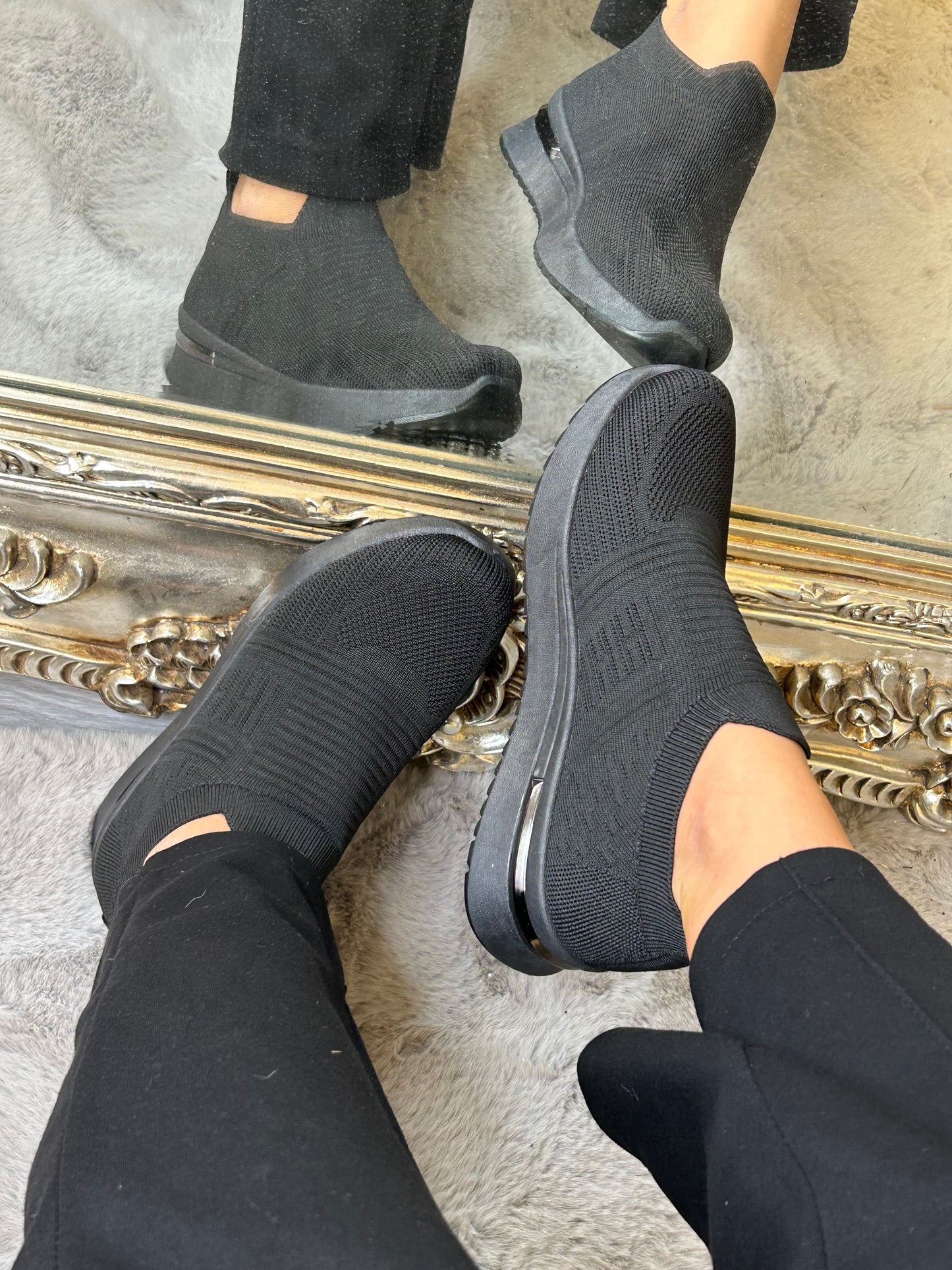 Black slip on sock trainers