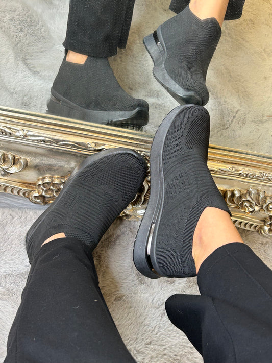 Black slip on sock trainers