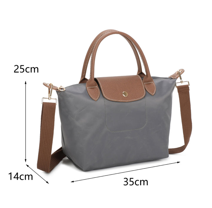 Grey handbag with brown handles and strap 