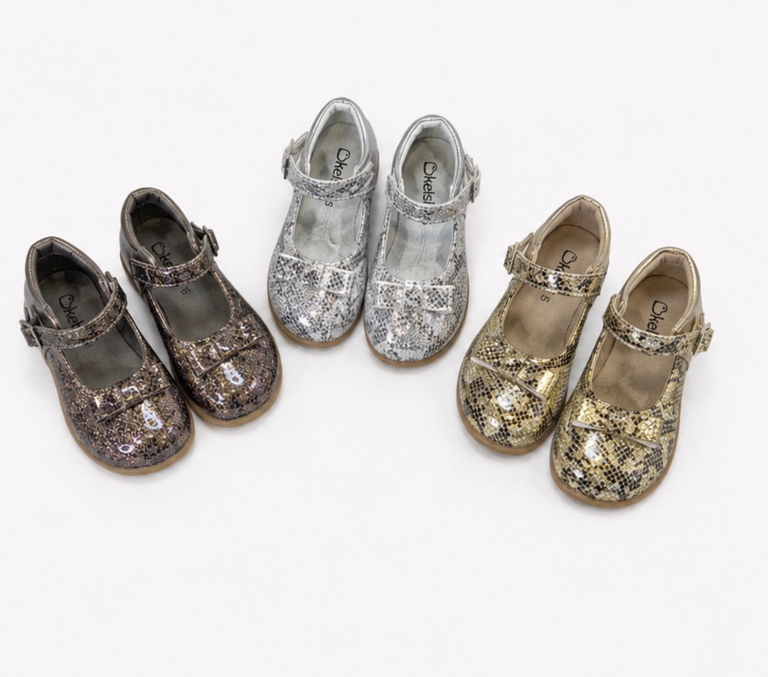 Girls glitter shoes with buckle strap and bow detail in bronze, silver and gold snake print