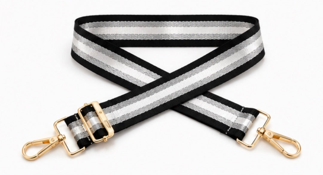 Adjustable striped handbag strap with premium metal hardware for shoulder and crossbody bags.
