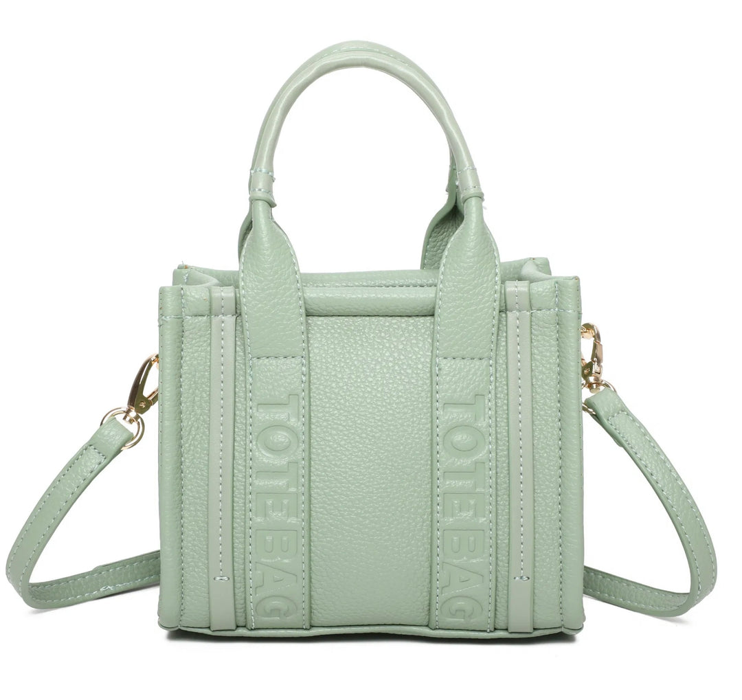 Light green tote bag text handbag with gold detail 