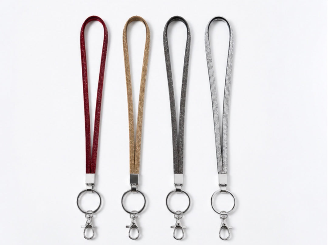 Crystal sparkle lanyards in red, gold, grey and silver with silver-tone keyring and clasp attachments.