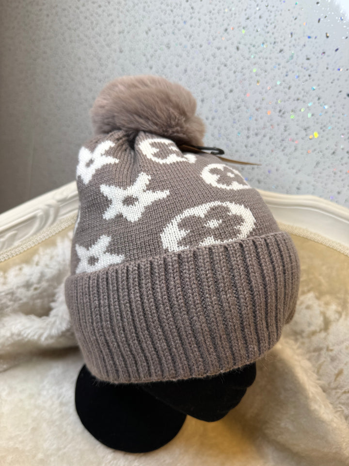 Flower detail bobble hats