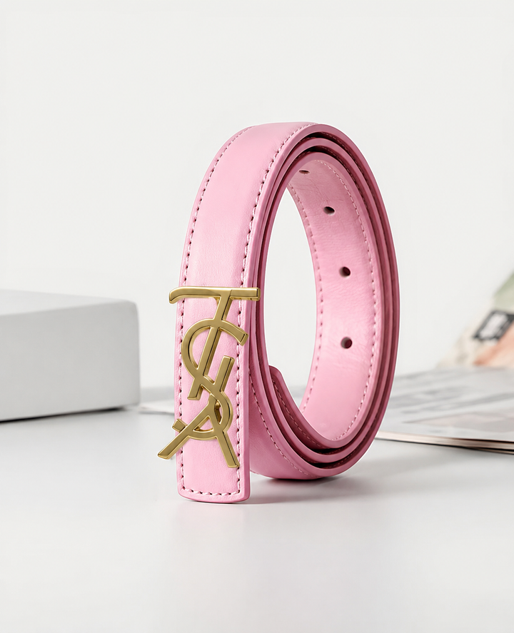 Pink slim faux leather belt with gold-tone statement buckle.