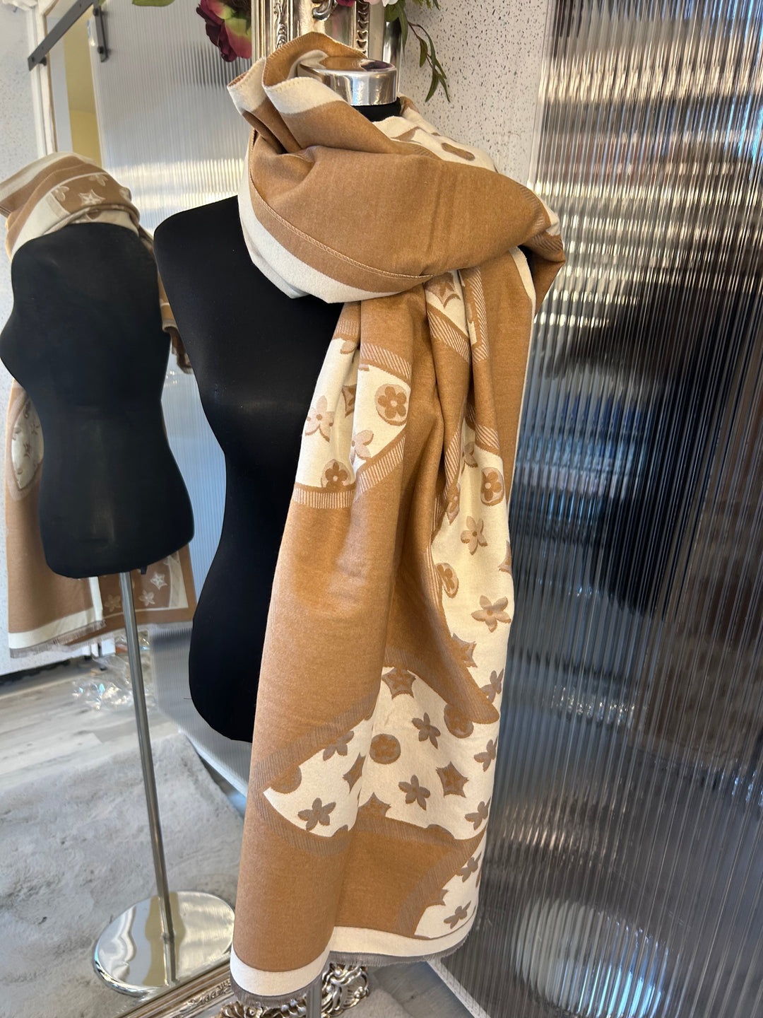 Oversized XL scarf with bold flower print design, displayed as a women’s fashion accessory.