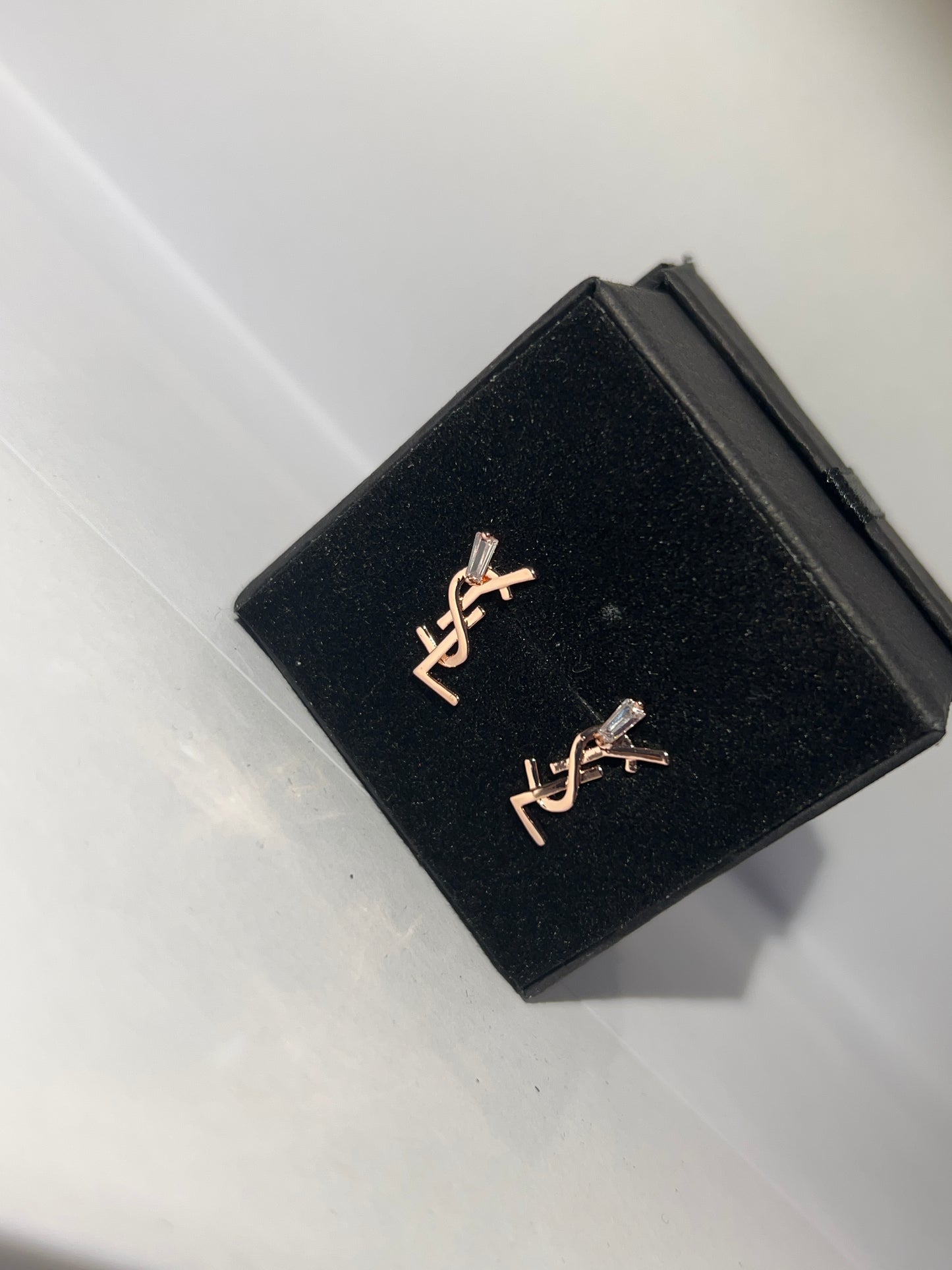 Rose gold stacked letter earrings