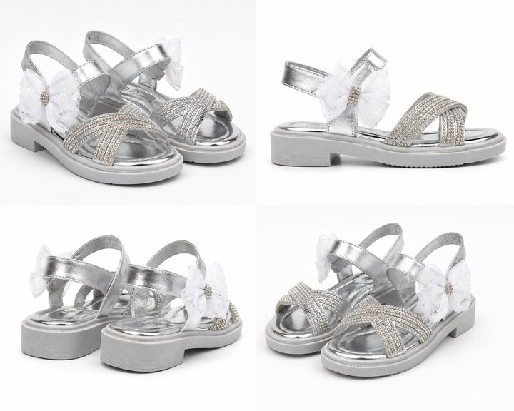 Silver girls’ sandals with sparkling diamanté crossover straps, oversized glitter mesh bow detail 