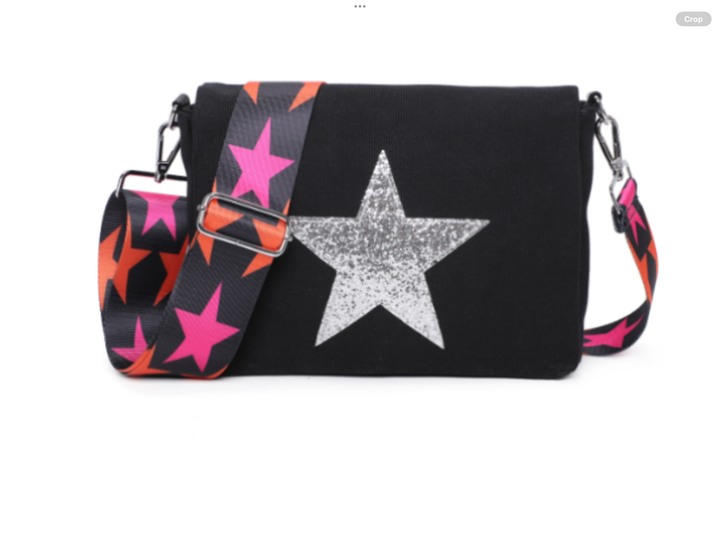 Black handbag with a silver star and colorful star-patterned strap 