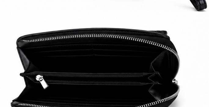 Black expandable purse with wrist strap and silver hardware 