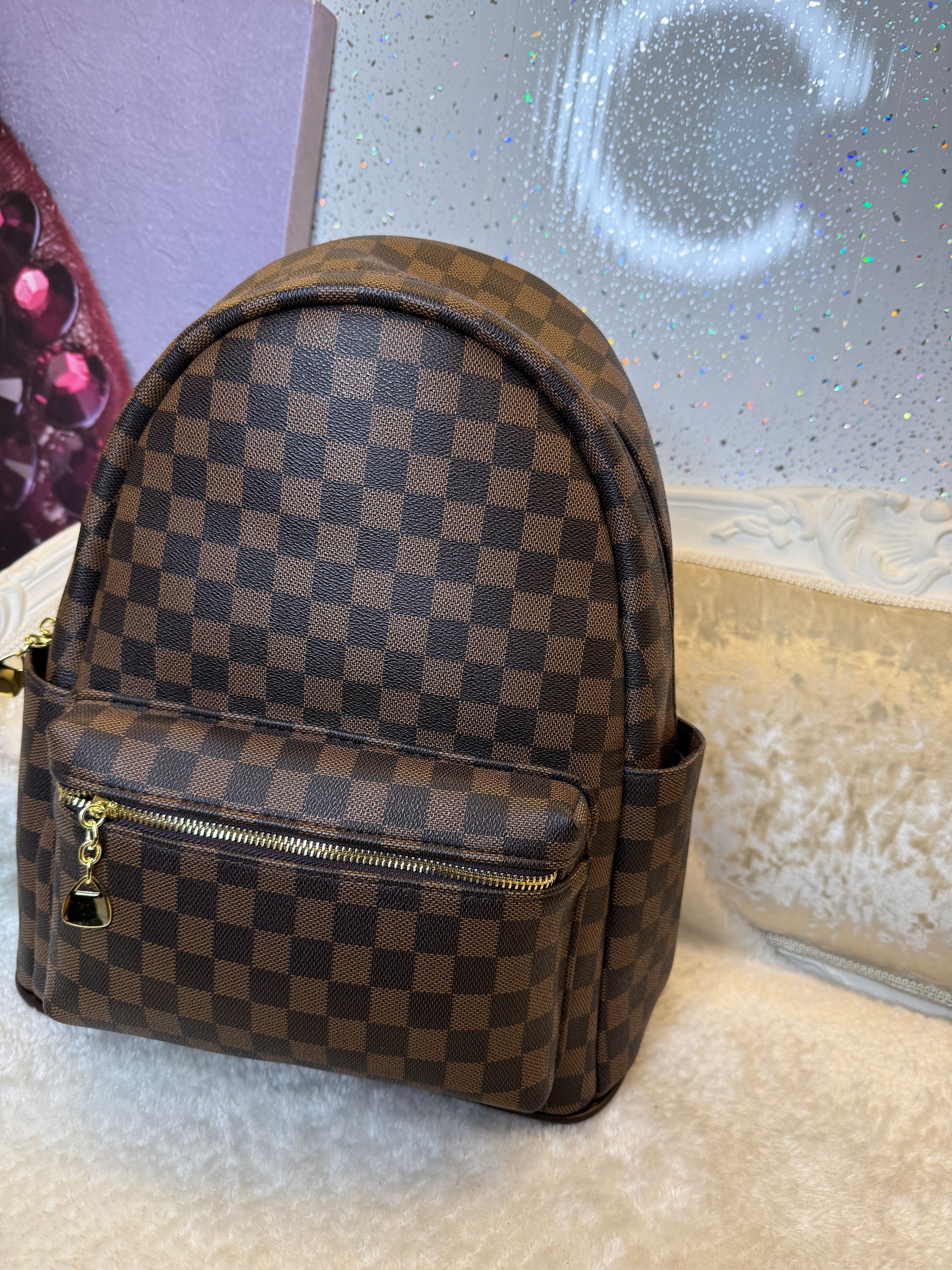 Brown checked rucksack backpack with gold detailing 