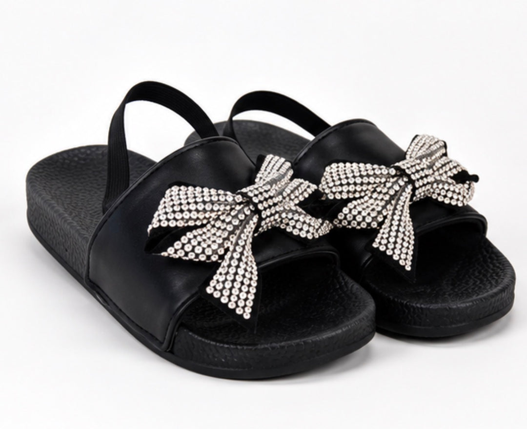 Black girls’ slider sandals with diamanté crystal bow detail and elastic back strap