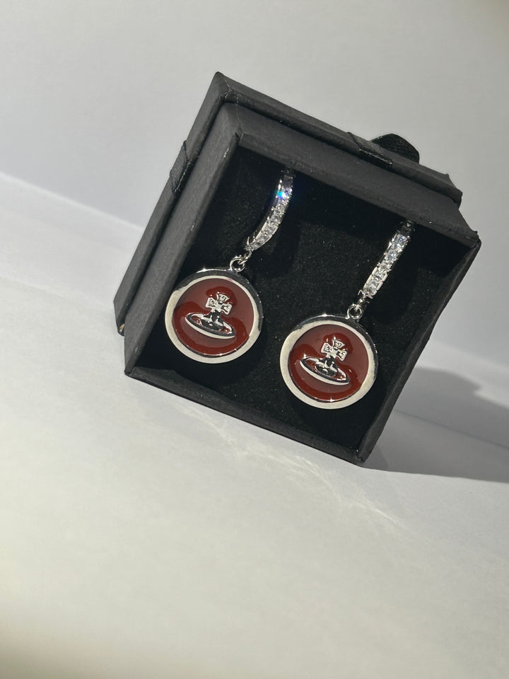 Burgundy planet dangle earrings