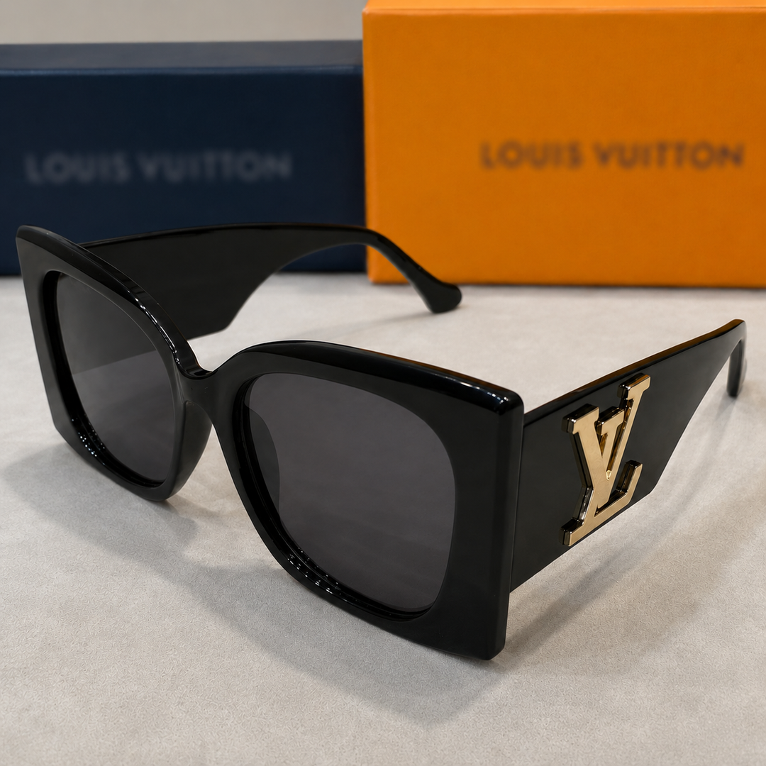 Chunky black sunglasses with gold detail 