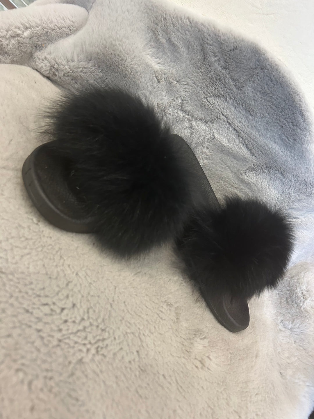 Black fur sliders with black sole 